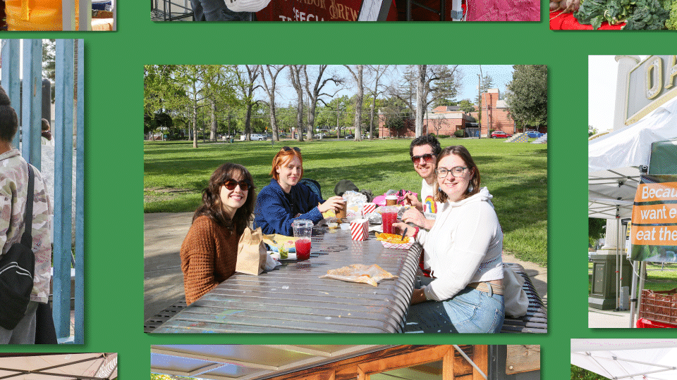 man taking a photo on a wharf